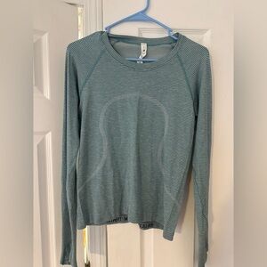 SOLD Like new Lululemon swiftly tech waist length size 8